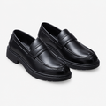 Black men's penny loafers with lug sole shown as a complete pair