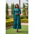 Women's teal long-sleeve ruffle cuff gold button cutwork lace panel midi dress - model shot