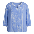 Blue floral and striped split-neck blouse on an invisible mannequin