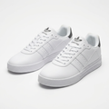 Pair of white tonal-stripe low-top cupsole sneakers on a white background