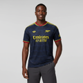 Nigerian male model wearing Arsenal third dark navy jersey