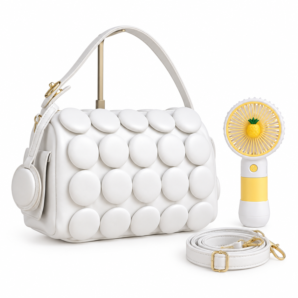 White circle-appliqué shoulder bag with matching strap and yellow handheld fan on white background