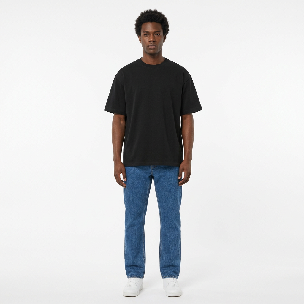 Full-body Black adult model wearing a plain black crew-neck T-shirt
