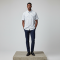 Nigerian male model wearing white and blue plaid short-sleeved shirt