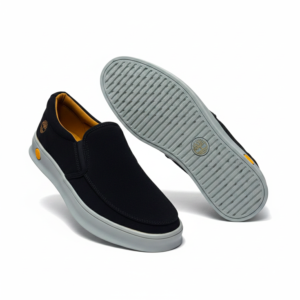 Men's navy black suede slip-on sneaker pair front and sole view on white background