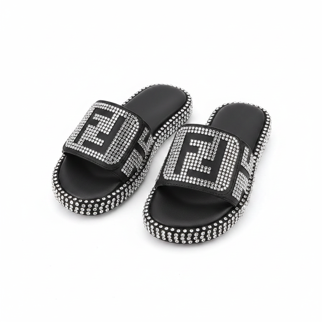 Black geometric grid rhinestone crystal slide slipper ghost mannequin pair on white background