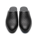 Pair of men’s black woven-textured mule shoes