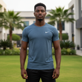 Nigerian male model wearing steel blue heathered athletic performance tee