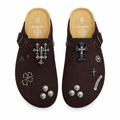 Chocolate cross-charm clog pair on white