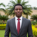 Nigerian male model wearing burgundy wine red solid satin necktie with white shirt and charcoal suit