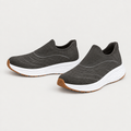 Charcoal mesh slip-on sneakers with sculpted white soles and gum outsole accents