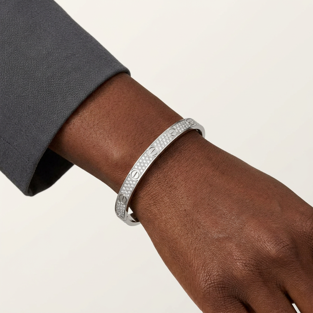 Silver-tone stone-set bracelet worn on a model’s wrist