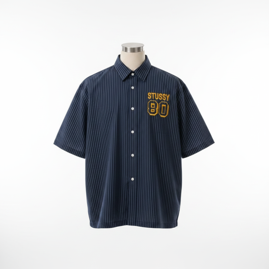 Ghost mannequin navy pinstripe Stussy 80 gold chest varsity shirt front view