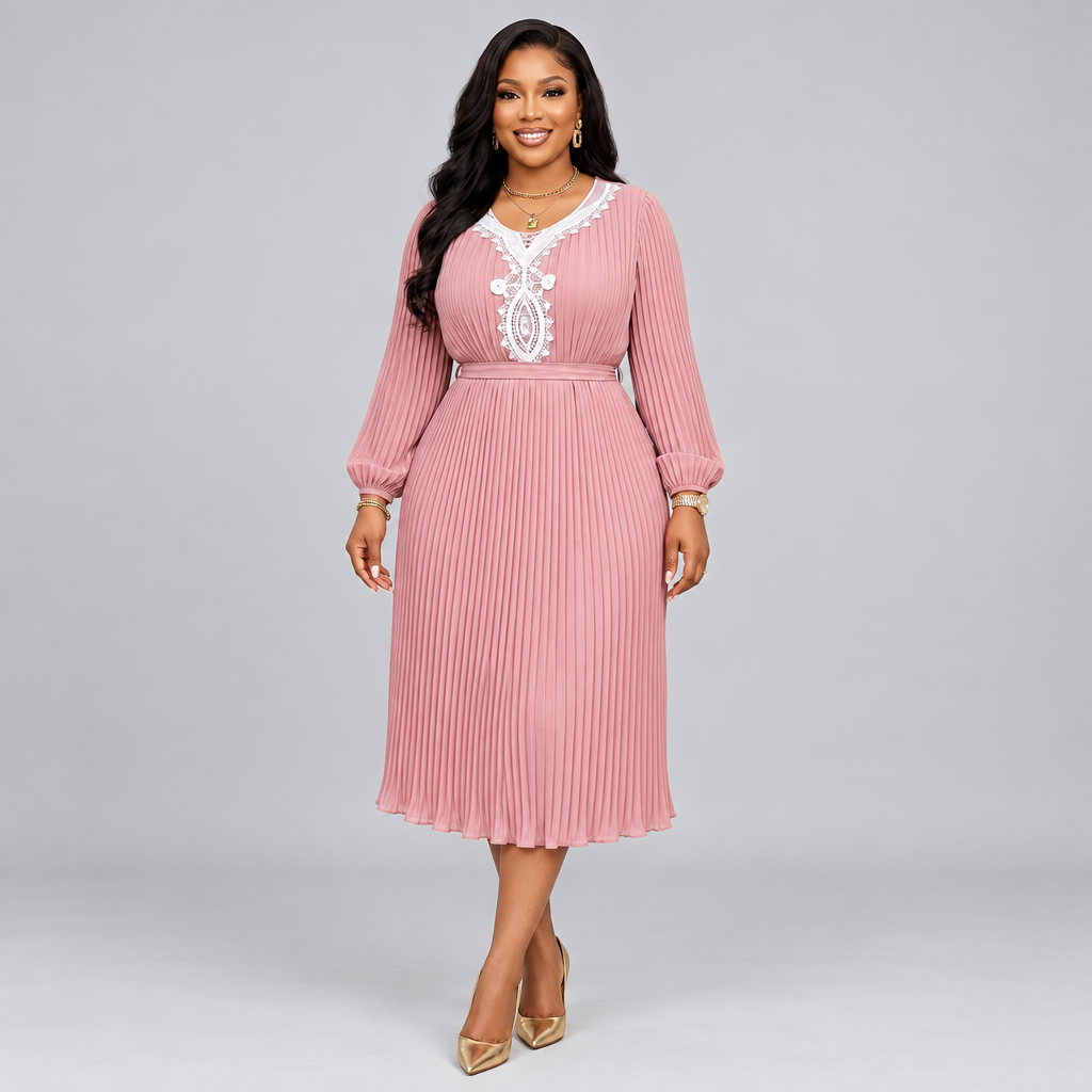 Black Nigerian woman wearing a dusty pink pleated midi dress with white lace detail