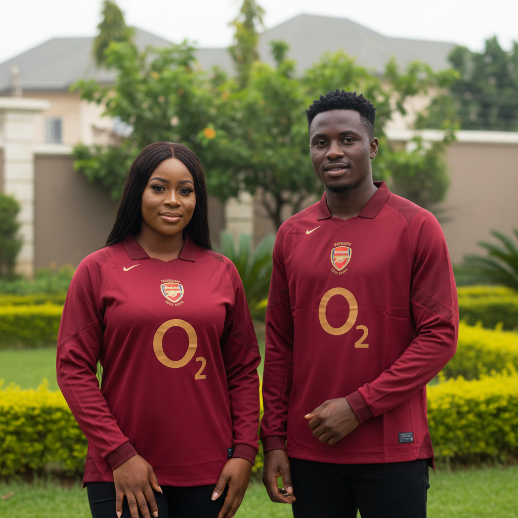 Nigerian female and male models wearing the deep burgundy long-sleeve retro football jersey
