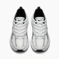 Front view of white and silver-grey mesh sneaker pair with black accents