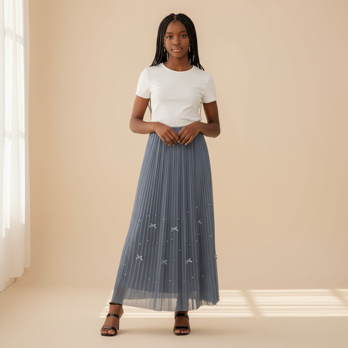 Nigerian girl wearing steel blue bow pleated midi skirt - front view