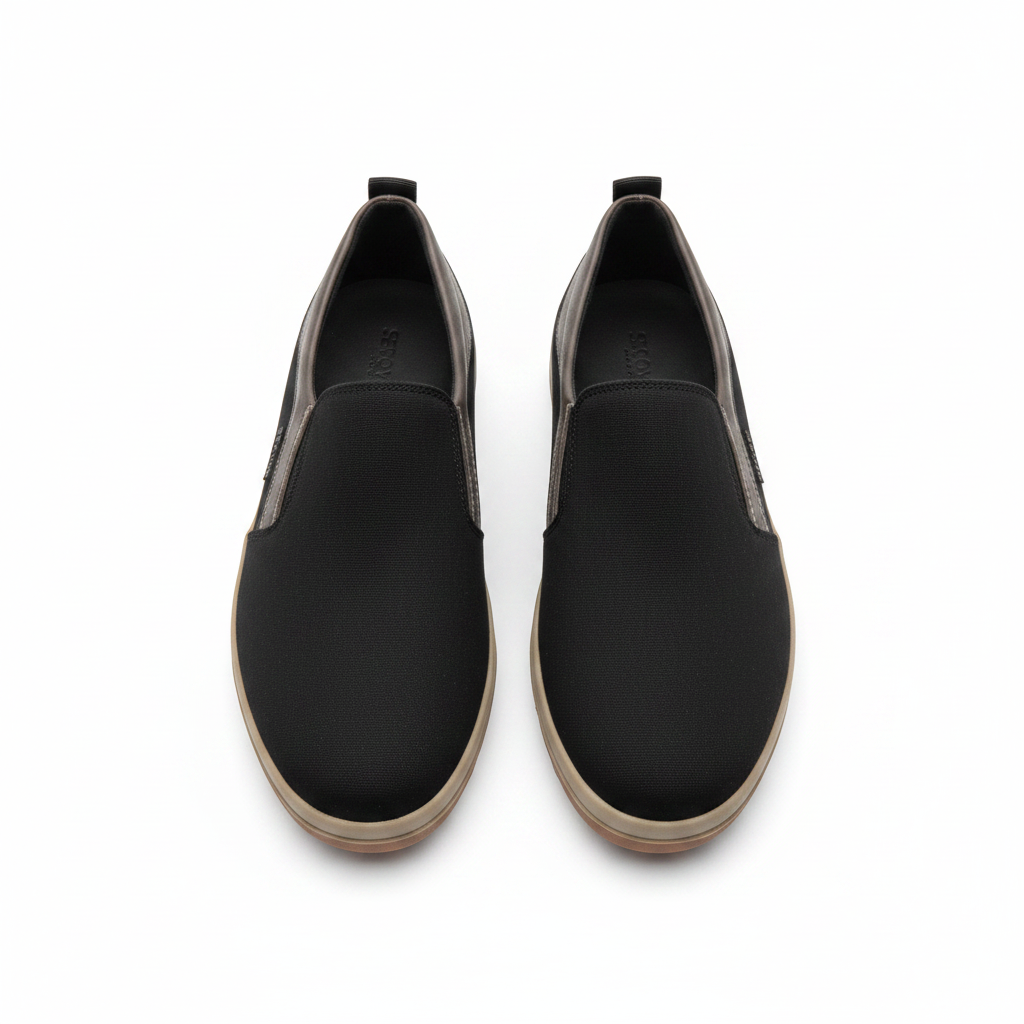 Segvor black canvas and grey leather slip-on loafer ghost mannequin product shot, plain white background