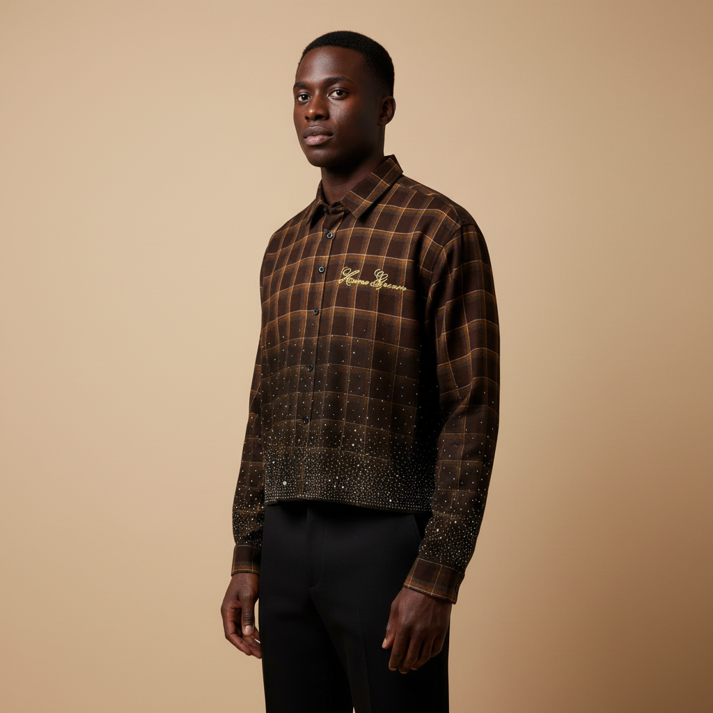 Man wearing brown crystal checkered crop shirt with black trousers