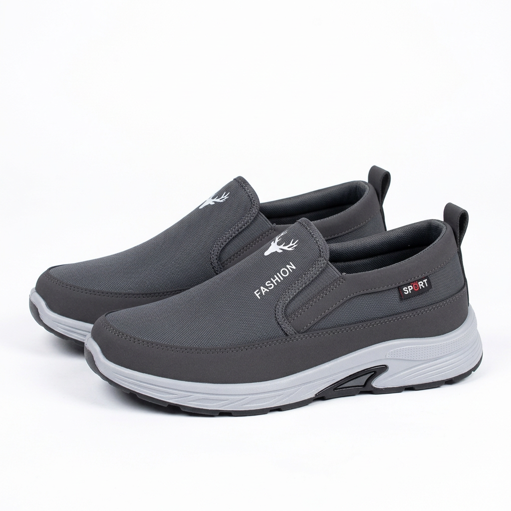 Charcoal grey contrast-sole slip-on shoes, pair on a white background