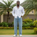 Nigerian male model wearing light blue wide-leg denim jeans