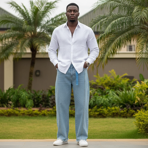 Nigerian male model wearing light blue wide-leg denim jeans