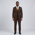 Full-body Black adult model wearing a dark brown three-piece suit