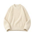 Cream textured crew-neck knit sweater with long sleeves and ribbed trims