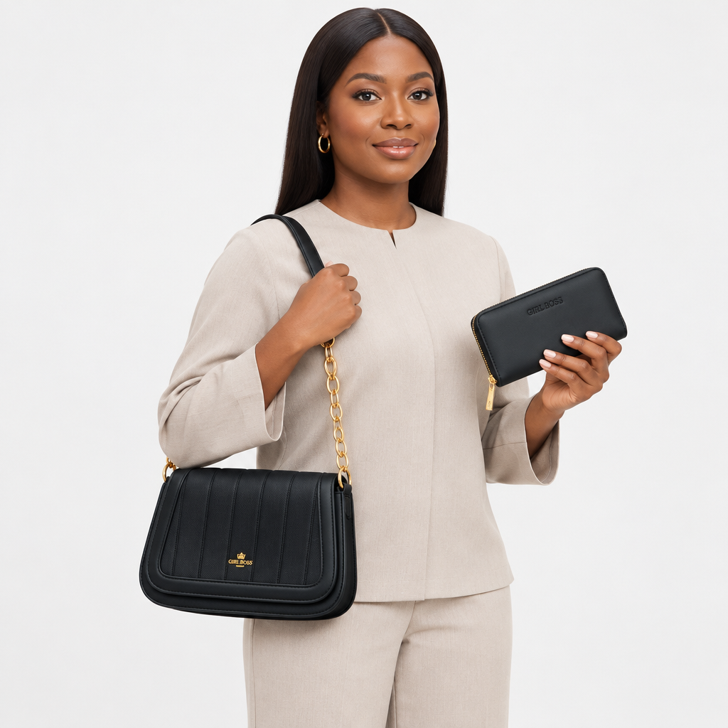 Adult woman carrying a black shoulder bag and matching wallet