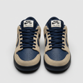 Navy and sand low-top sneakers, front view