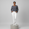 Nigerian female model wearing Navy Blue Floral Print Long Sleeve Top - front view