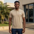 Young Nigerian male model wearing sand beige equestrian logo polo shirt
