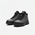 Charcoal grey leather ankle boots with black lug sole, centred on a plain off-white background
