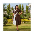 Women's Dark Espresso Brown Abstract Print Pleated Midi Dress — Nigerian female model shot
