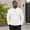 Black Nigerian adult model wearing a white textured long-sleeve pullover