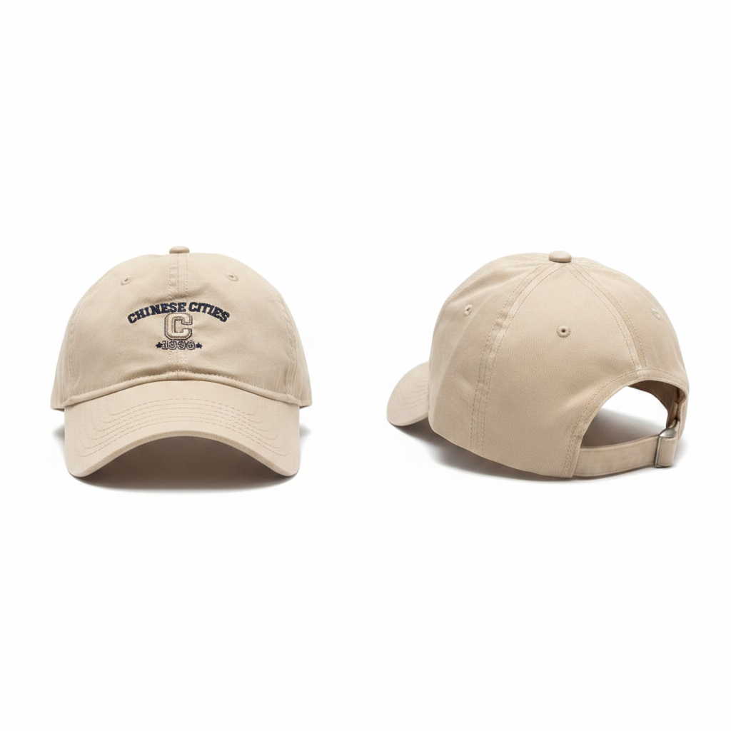 Cream beige collegiate dad cap with dark navy embroidery ghost mannequin front and side view