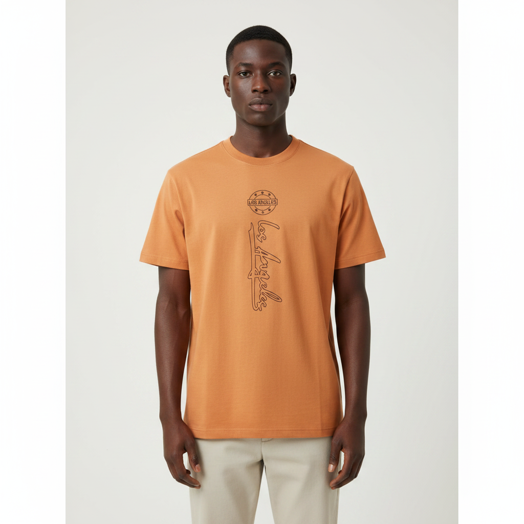 Model wearing the orange outline script graphic t-shirt