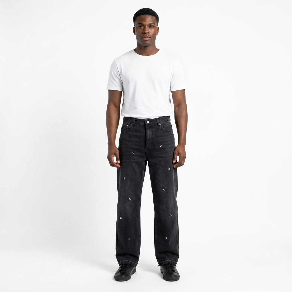 Full-body male model wearing black eyelet-detail wide-leg jeans