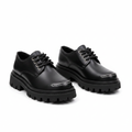 Black leather contrast stitch chunky lug sole Derby shoe ghost mannequin product shot, plain white background