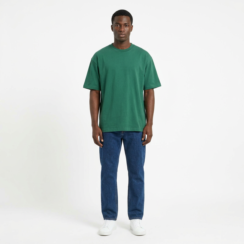 Full-body Black adult model wearing a plain green crew-neck T-shirt