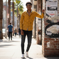 Young Nigerian male model wearing crown print mustard yellow shirt
