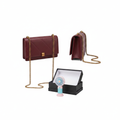 Burgundy quilted crossbody bag ghost mannequin front and side view with mini fan and gift box