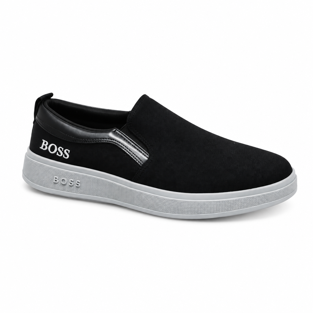 Black slip-on sneaker with silver-tone side detailing and a light grey sole