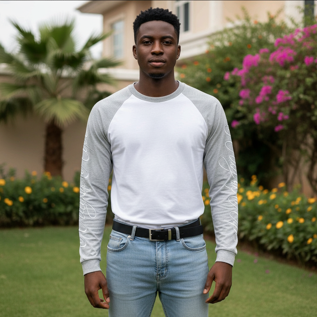 Nigerian male model wearing men's white grey raglan script embroidery long sleeve shirt