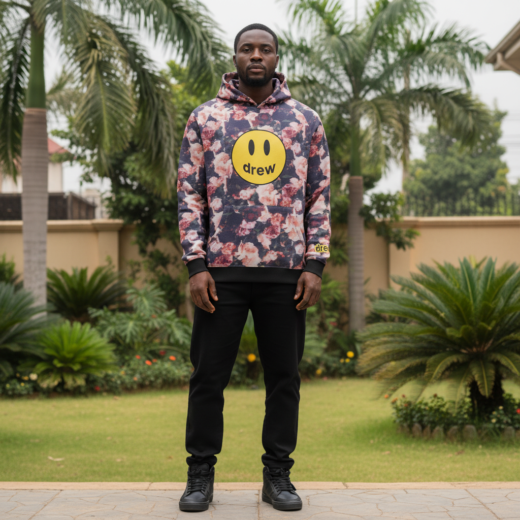 Floral smiley hoodie front view on Nigerian male model