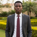 Nigerian male model wearing burgundy maroon tonal diagonal stripe woven necktie with white shirt and charcoal suit