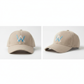 Beige tan geometric logo baseball cap with white and blue embroidery product shot front and side view