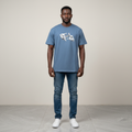 Black male model wearing a blue abstract hand graphic T-shirt