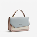 Pale blue cream and blush colour-block top-handle handbag on white