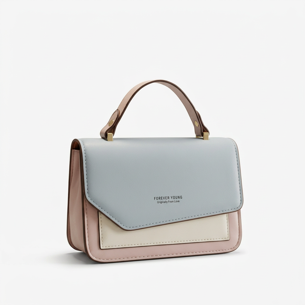 Pale blue cream and blush colour-block top-handle handbag on white